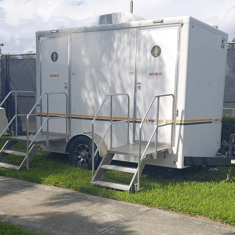 A restroom trailer at an outdoor event