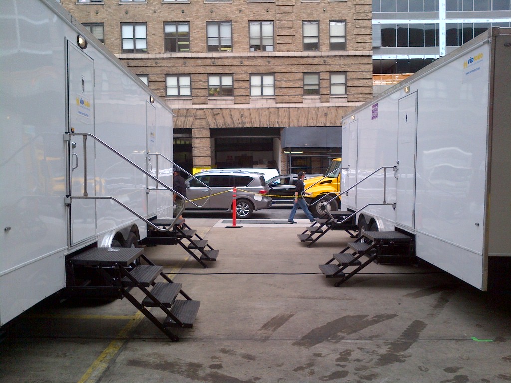 restroom trailers positioned at a nearby event