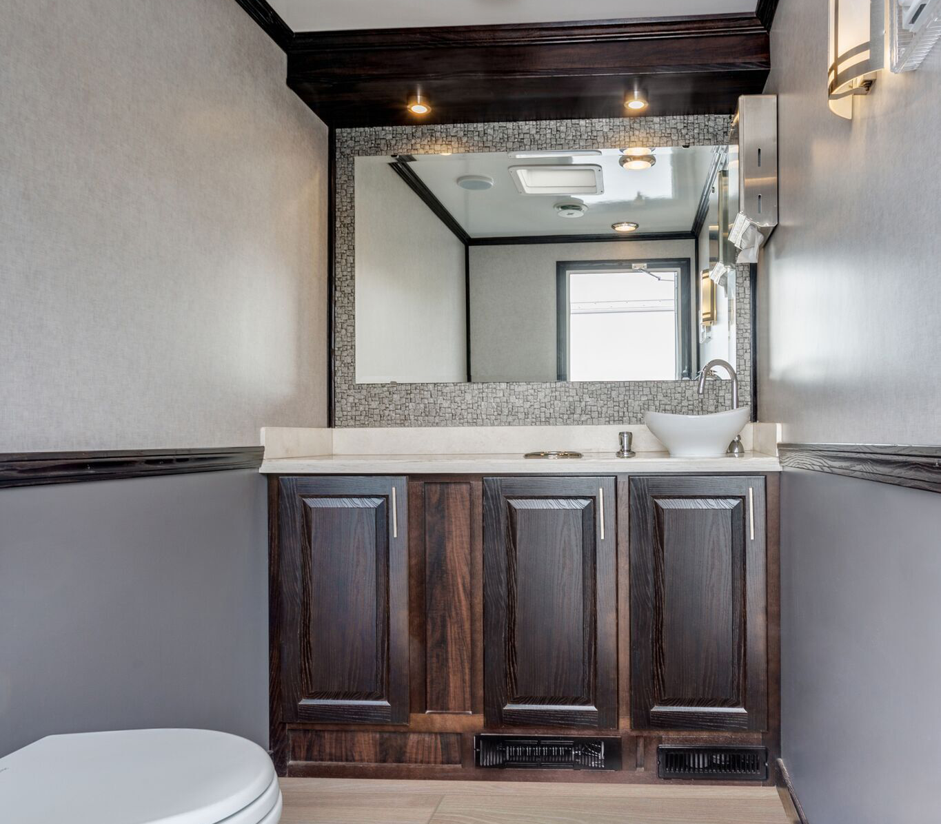 Inside of a stylish and comfortable restroom trailer at an Kentucky winery event