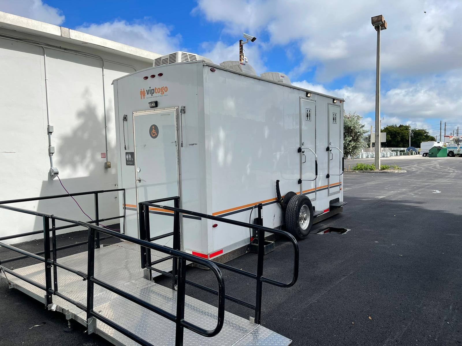 VIP To Go's ADA-Compliant luxury restroom trailer rental at a wedding in Iowa