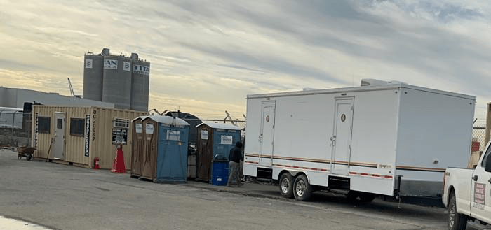 construction restroom trailer from VIP To Go on a road construction site