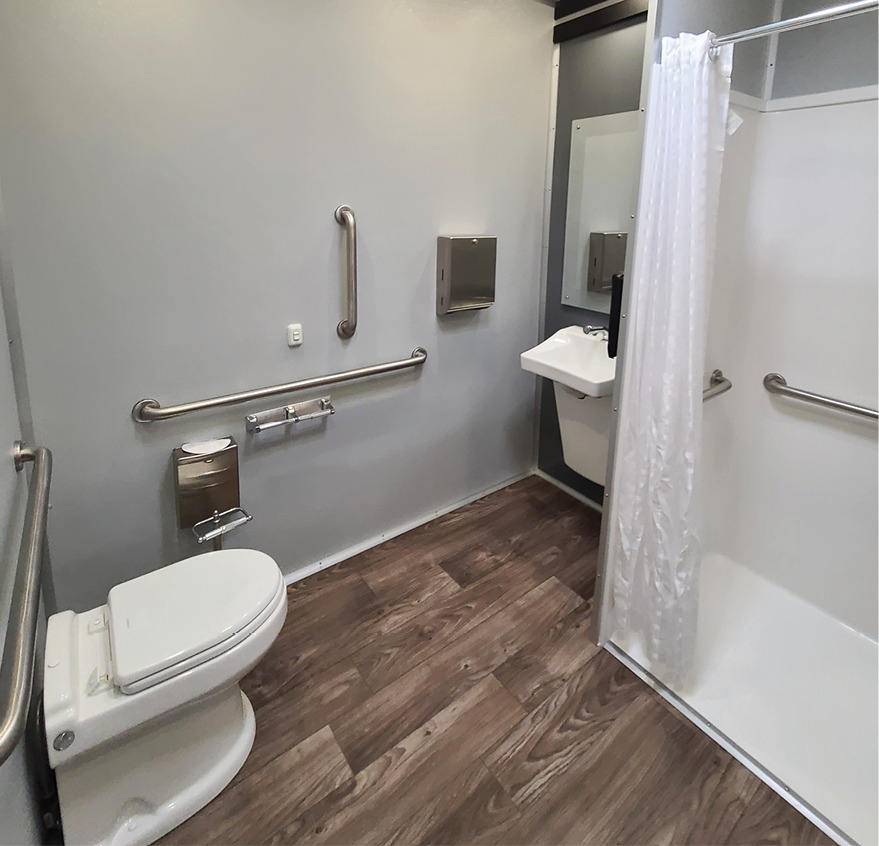 Interior view of ADA compliant restroom shower trailer combo for accessibility