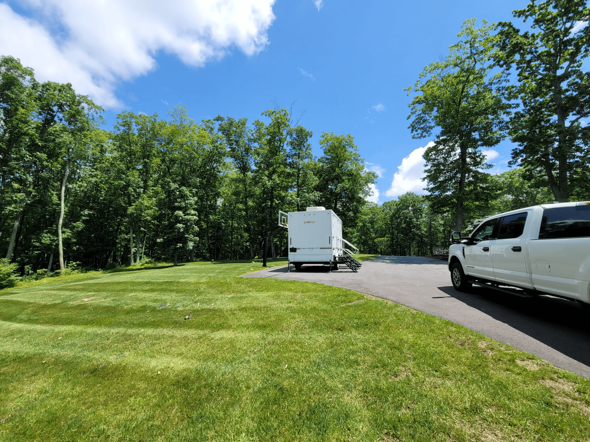 park restroom trailer in park setting